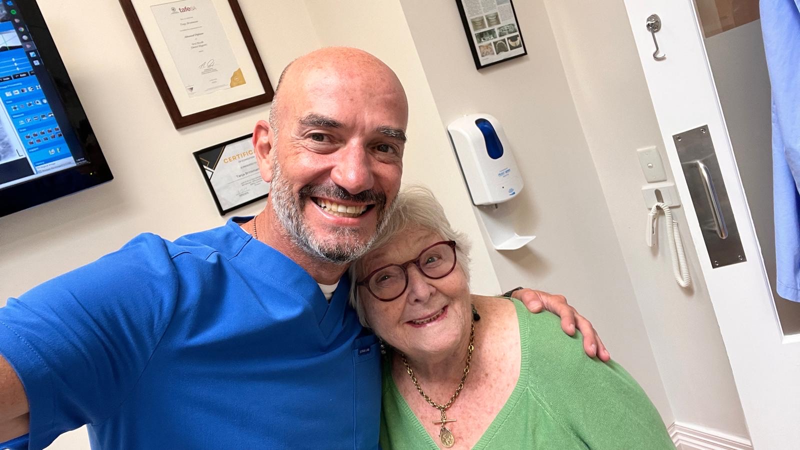 Dr Hillel New and a patient after a dental check-up.